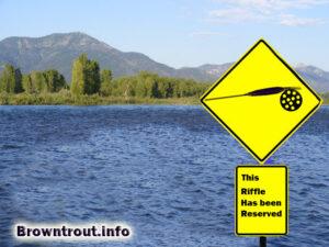 Fly Fishing Elitist sign in the river has been reserved. 