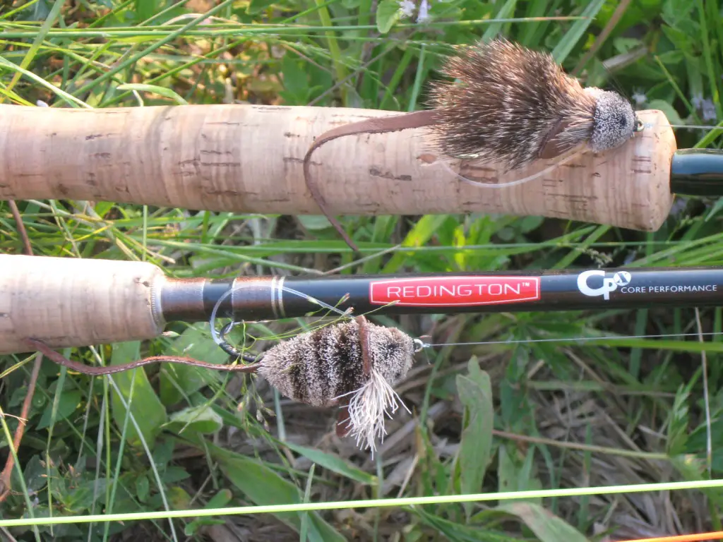 Fly rods rigged with mouse patterns.