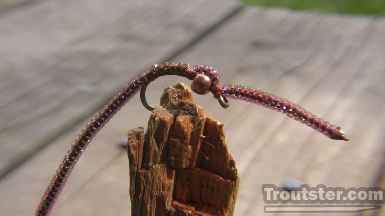 A San Juan worm fly pattern with special flashy chenille to give it a more natural appearance to the trout. 