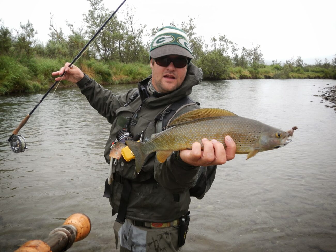 Mike Batcke of Stealthcraft boats with a beautiful Alaska Grayling, Arctic Grayling Identification, arctic grayling fish, arctic grayling facts, arctic grayling trout, what is arctic grayling